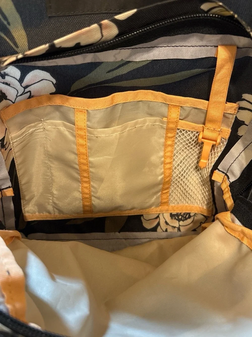 Jansport Trans Black Floral Backpack with Brown Base